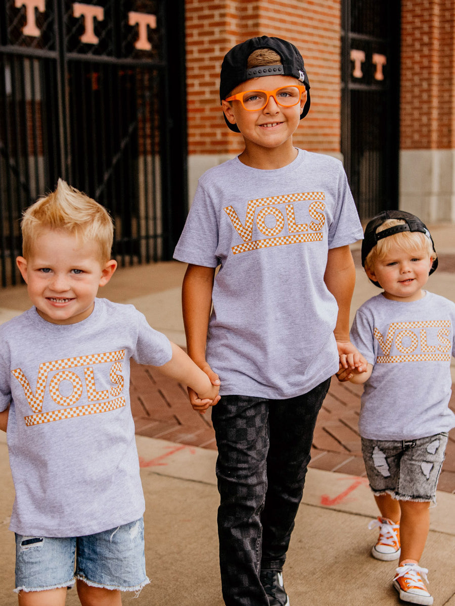Kids wearing VOLS grey tees