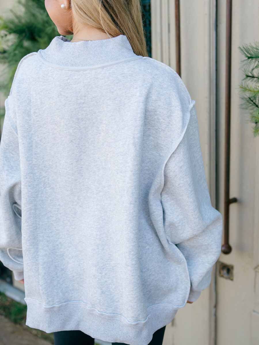 Light grey mock neck sweatshirt