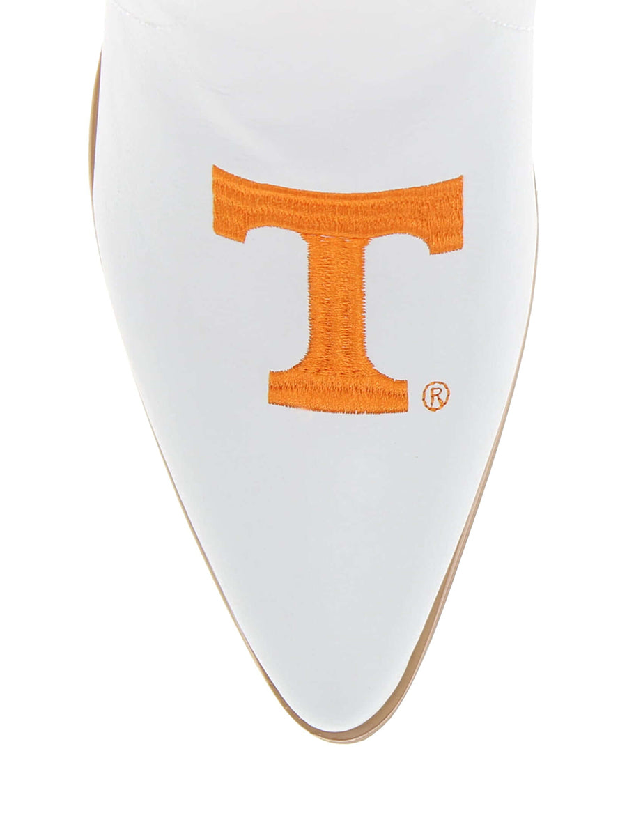 White boots with orange Power T on toe