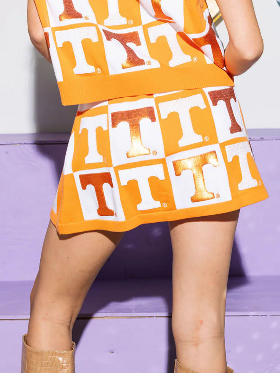 Orange and white checked mini skirt