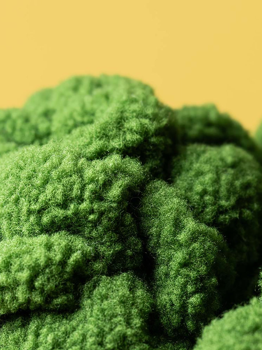Closeup of green broccoli plush toy