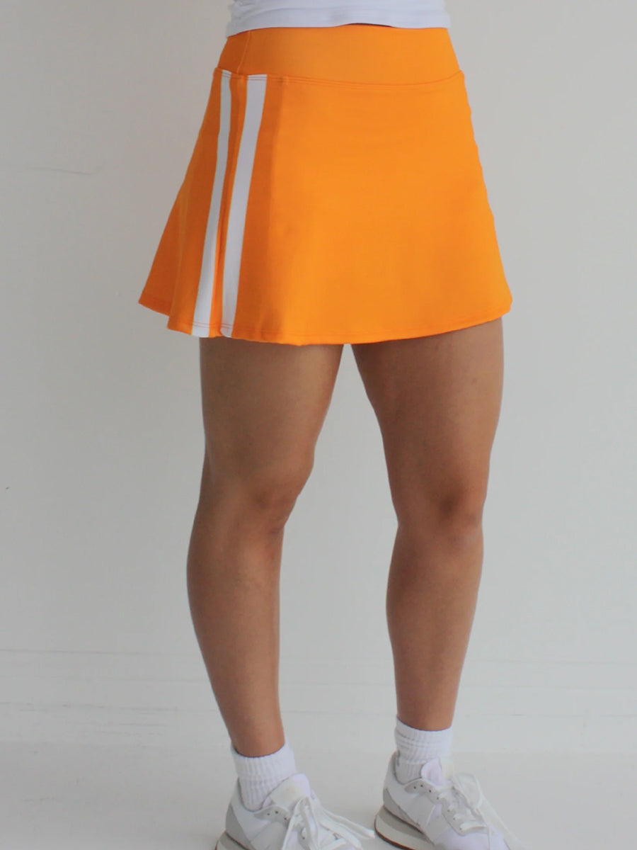 Orange Skort with white varsity stripes