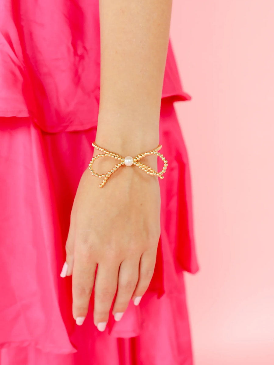 gold beaded bow bracelet