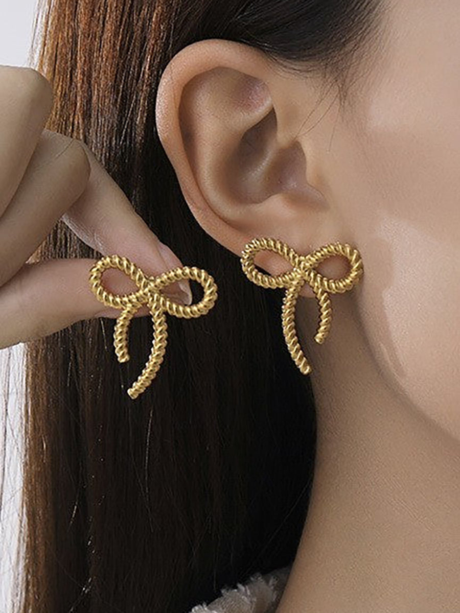 Gold Textured Bow Stud Earrings