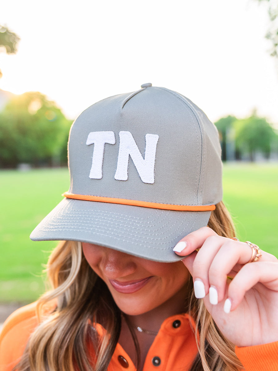 Gray hat with "TN"