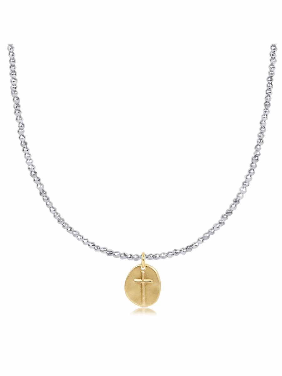 Silver beaded necklace with gold cross charm