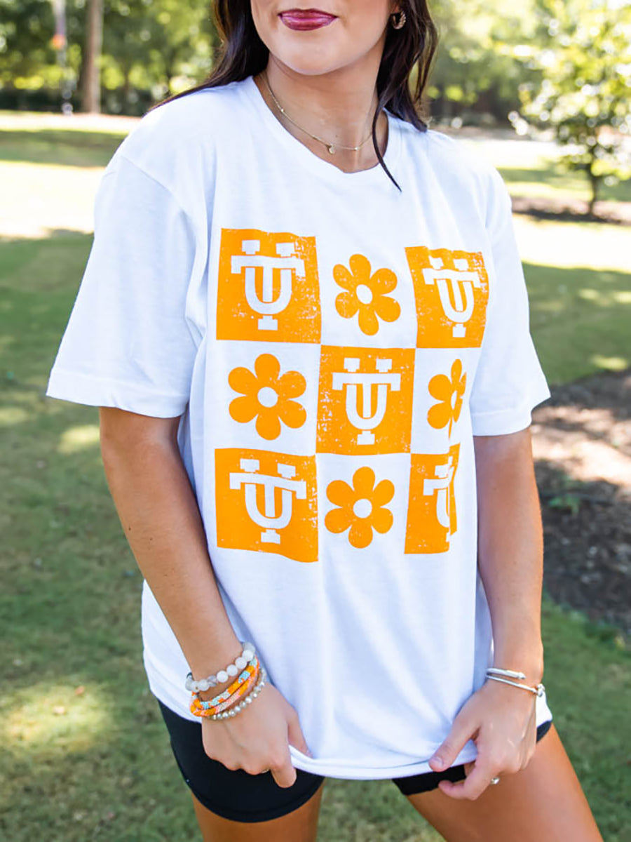 Orange and white checkerboard shirt