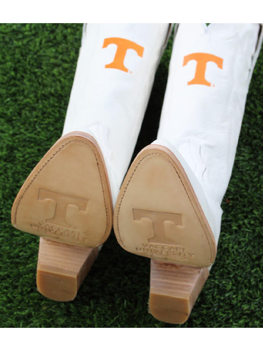 White cowboy boots with orange 'T' logo