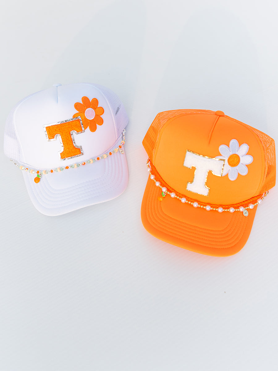 orange and white Tennessee hats