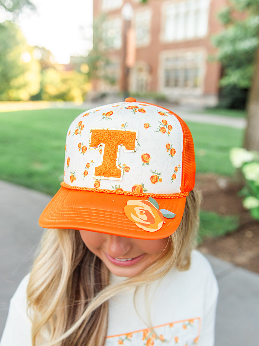 Floral Top and Orange Trucker Hat