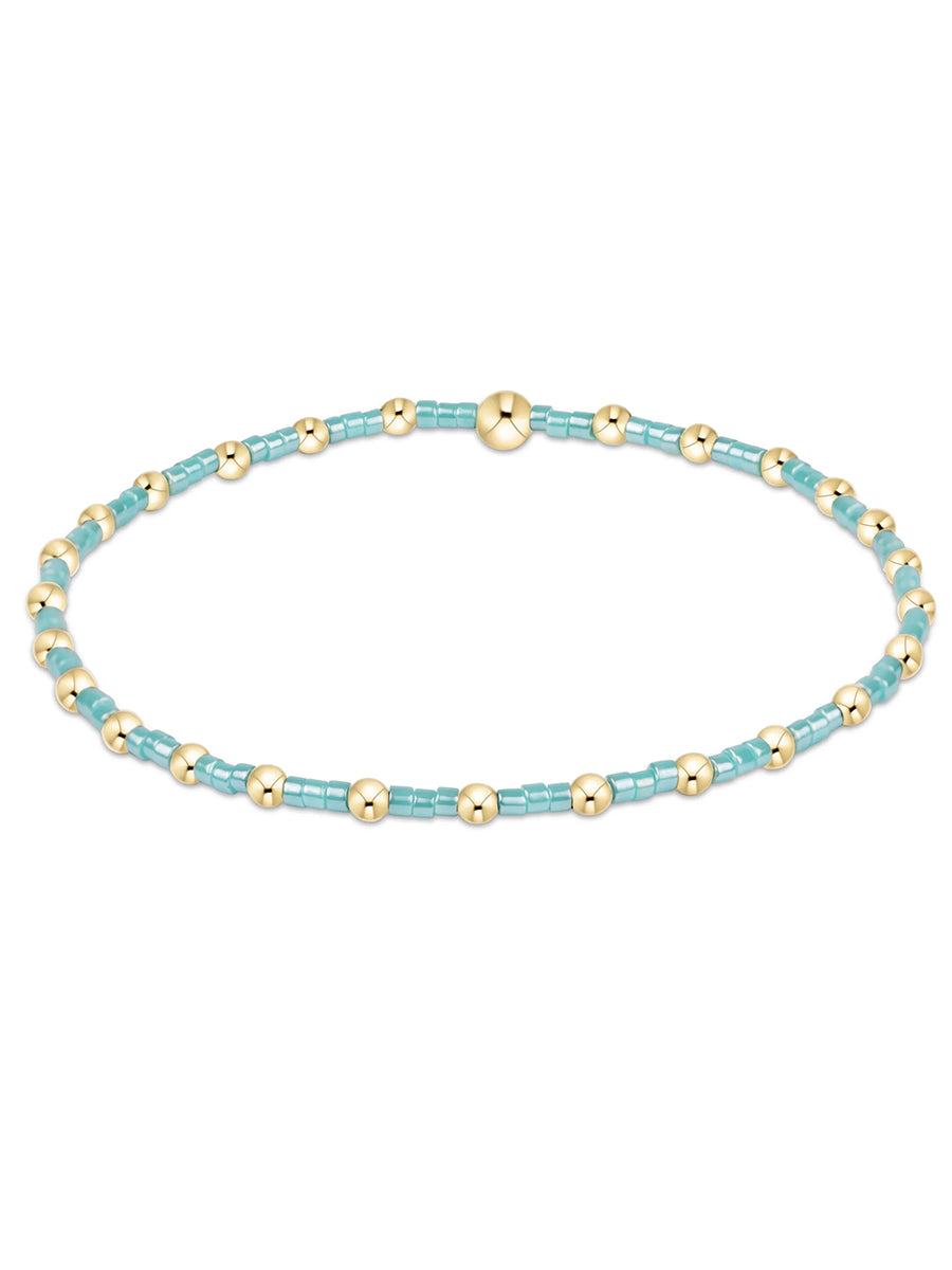 aqua seed and gold bead bracelet