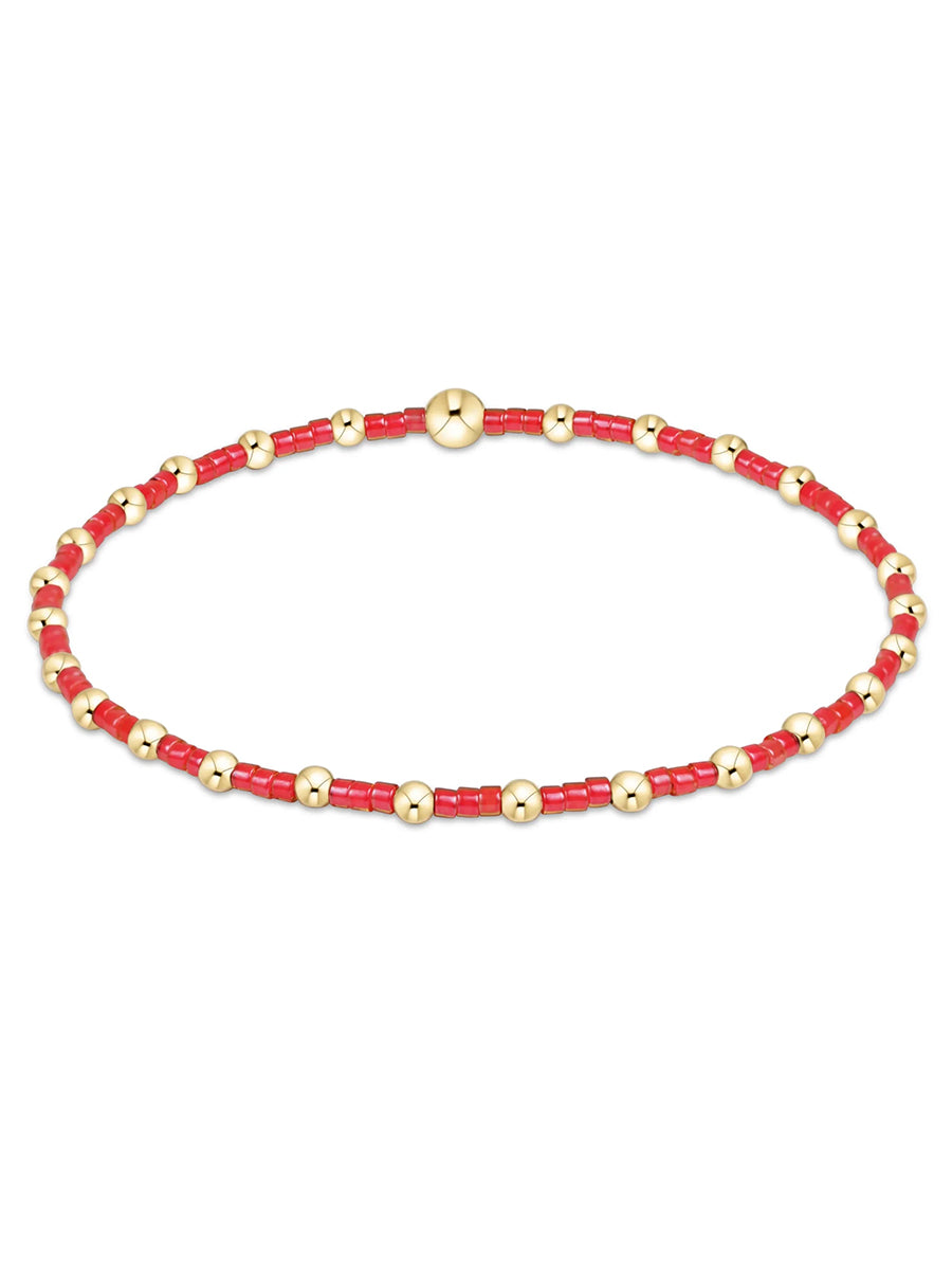 red seed and gold bead bracelet