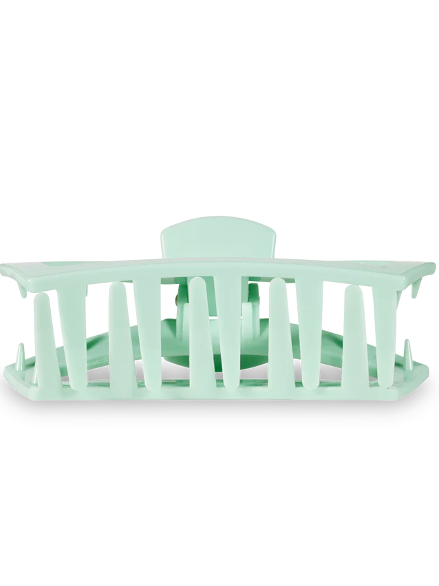 side view of mint green hair clip