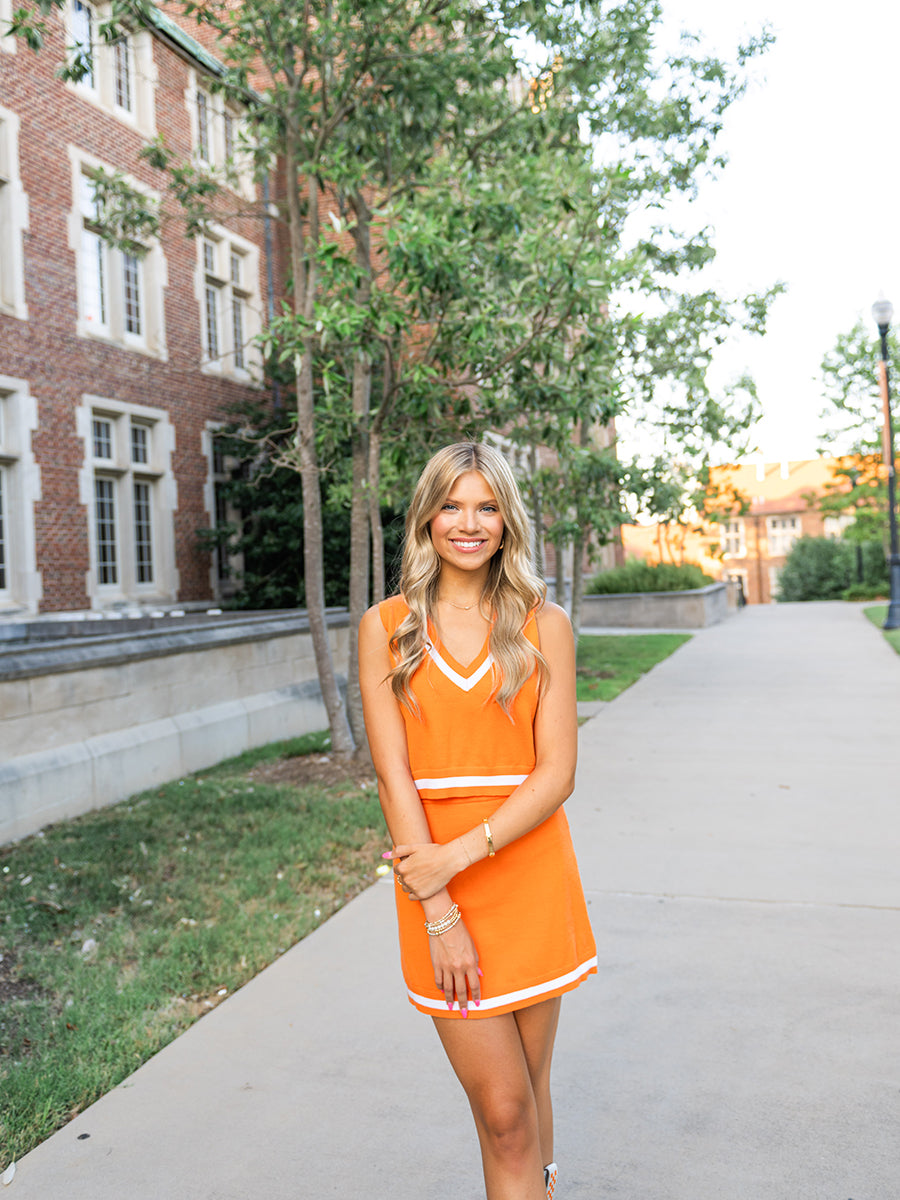 Orange and White Sleeveless Sweater and Skirt Set