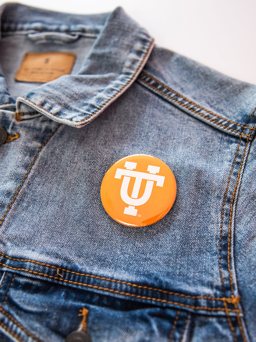 Orange button with white UT logo