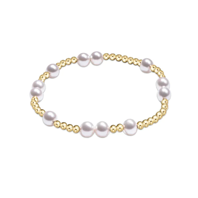 big pearls mixed with smaller gold bead bracelet