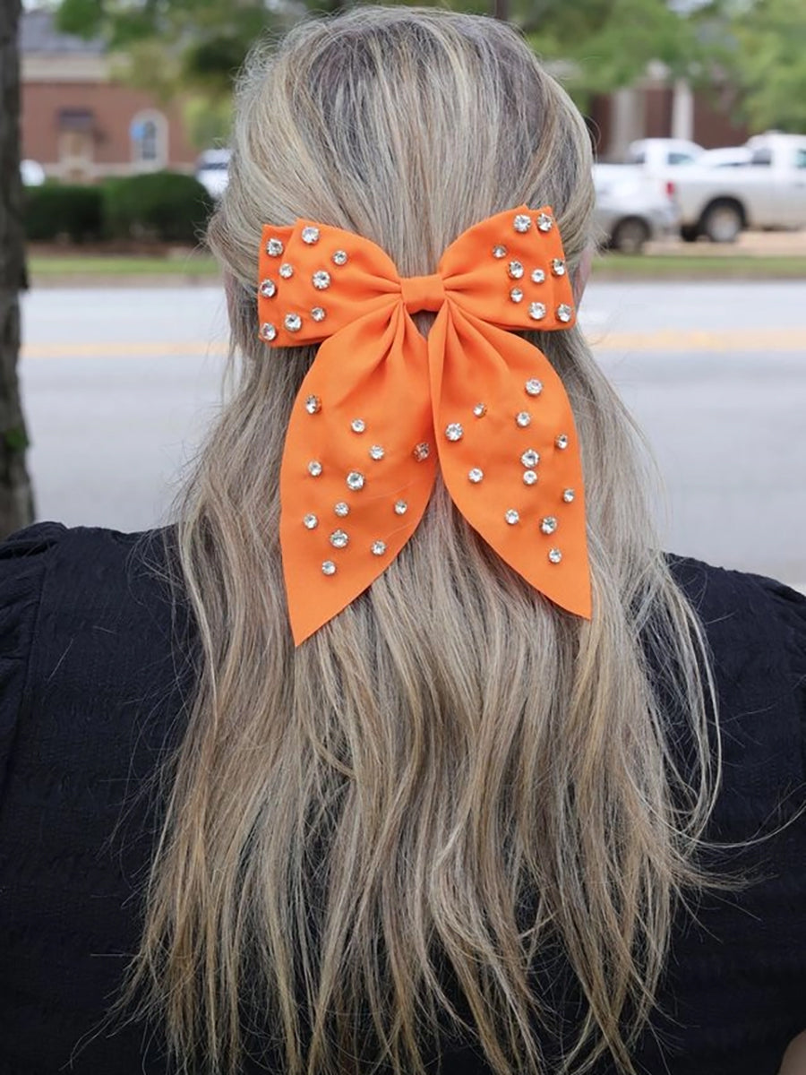 Orange hair bow with rhinestones