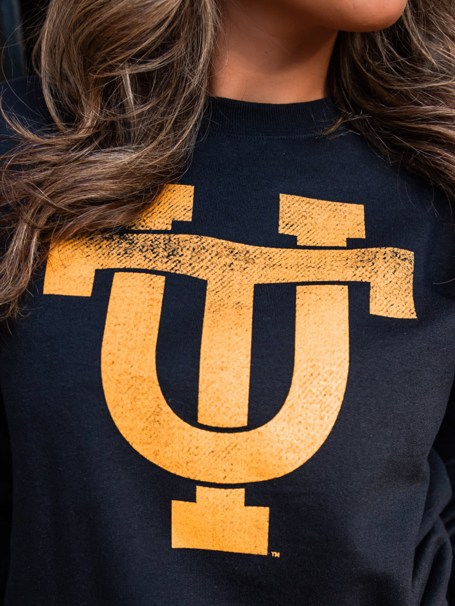 Closeup of UT logo on Black Top