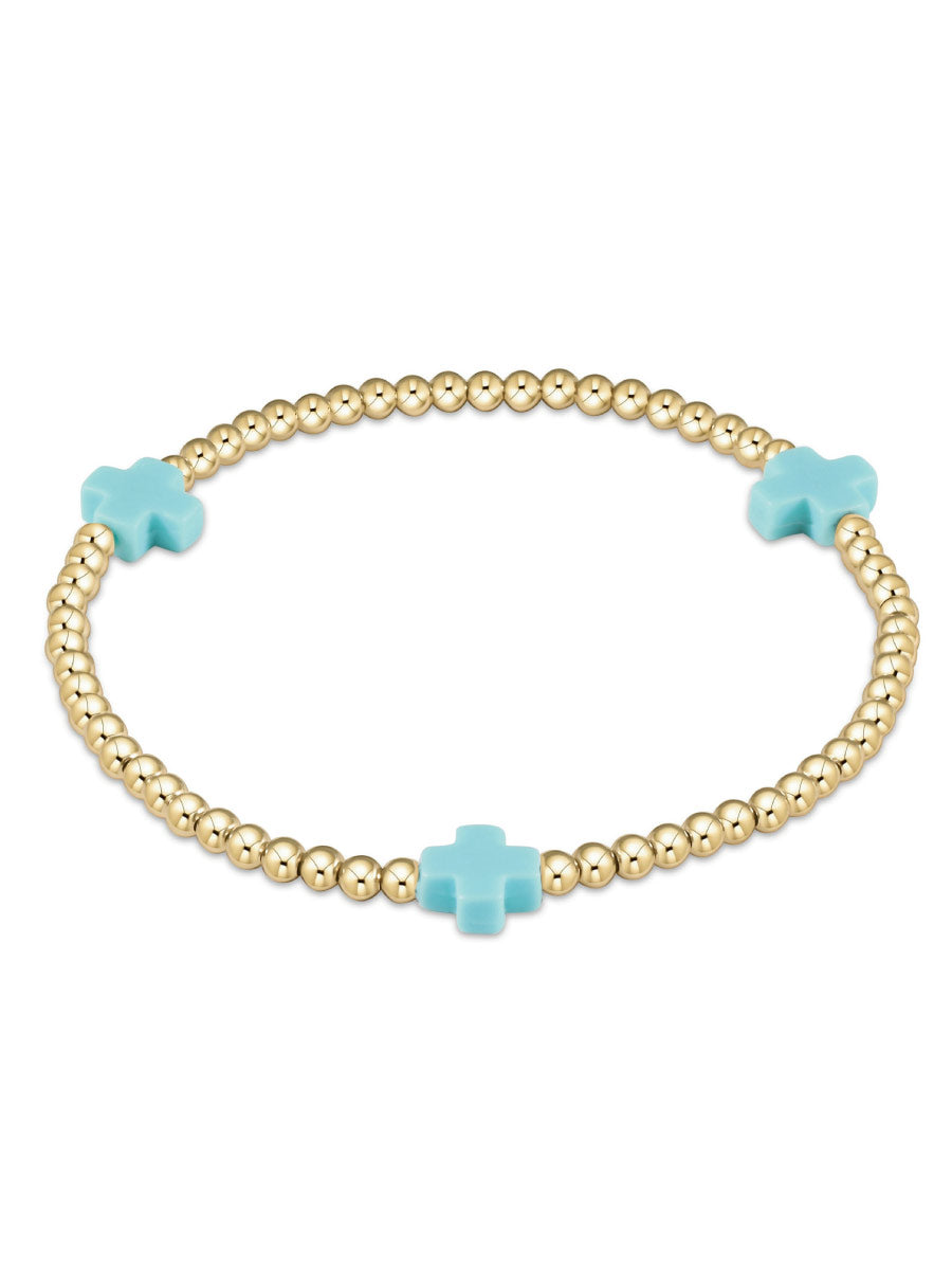 Gold Bead with Three Aqua Crosses Bracelet