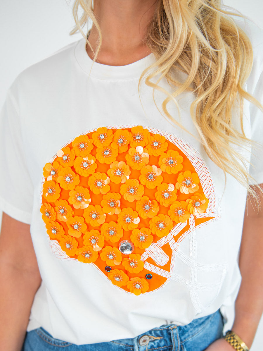 Sparkly Orange Football Helmet on White Shirt