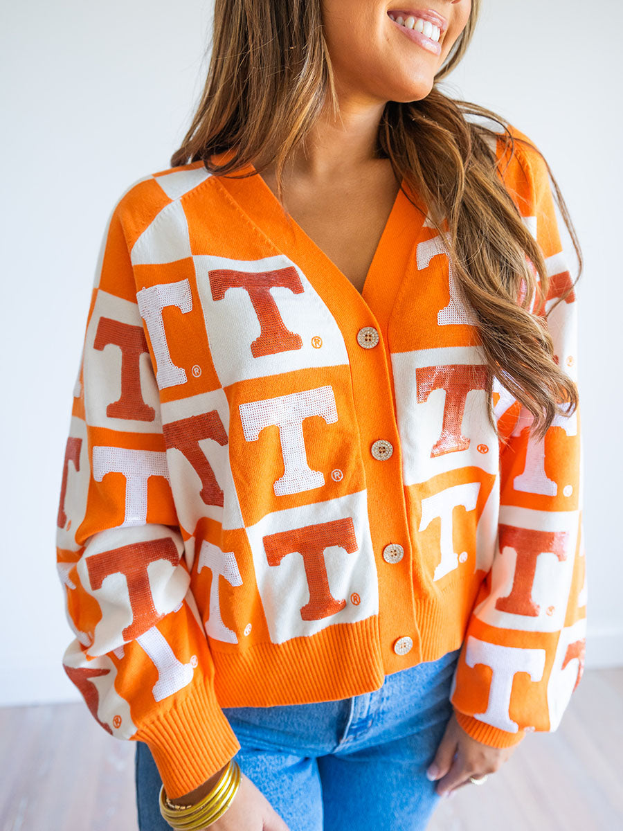 Queen of Sparkles Orange and white checkered cardigan with Power T's