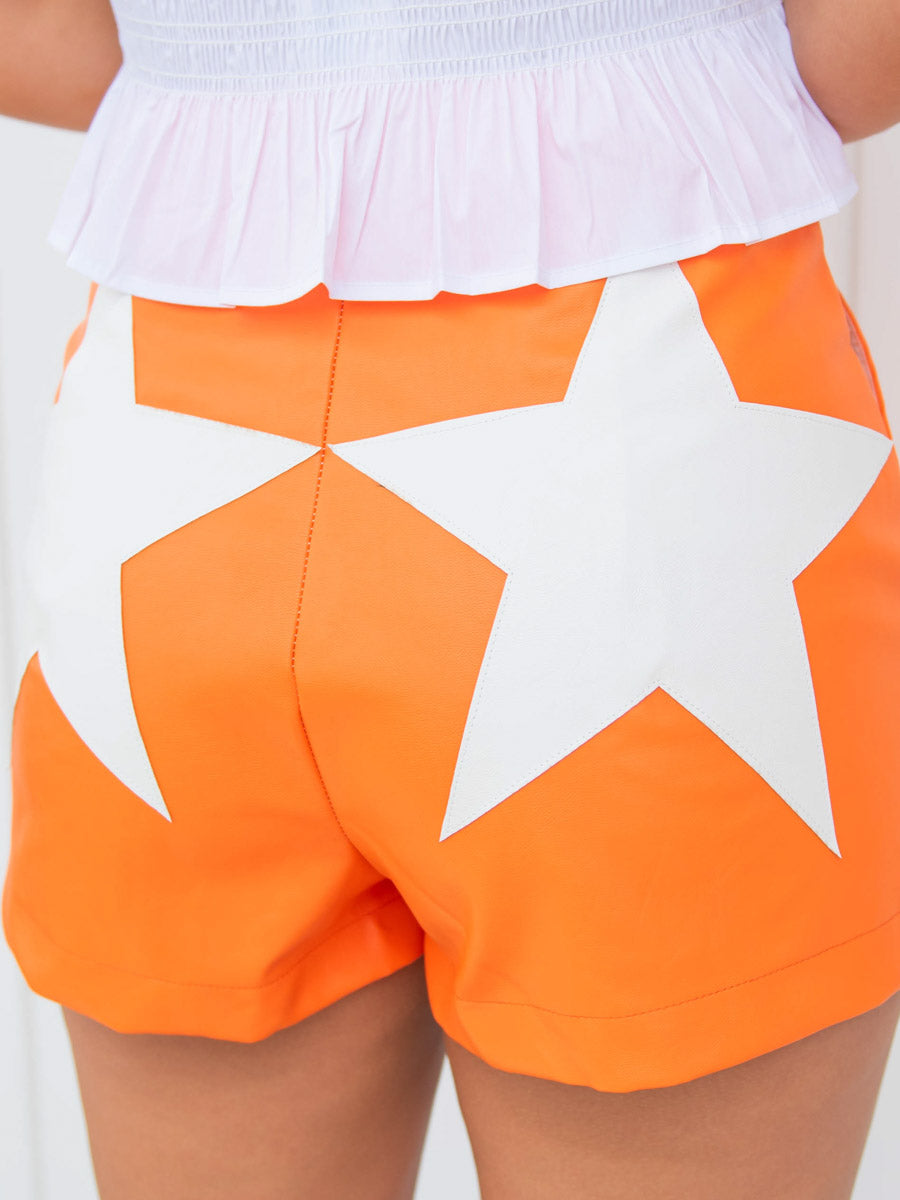 White Star Patches on Orange Shorts