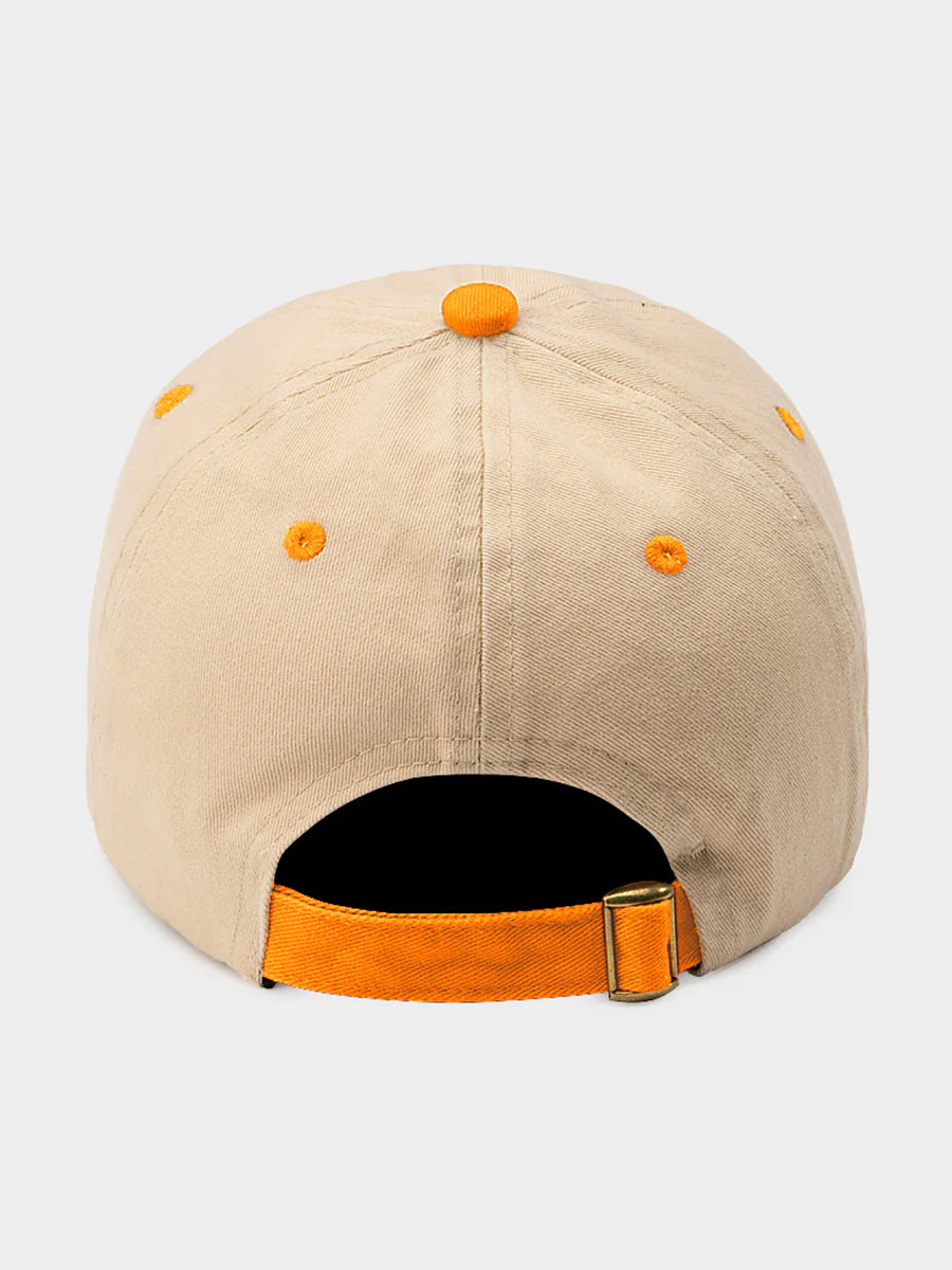 Back of orange and tan hat