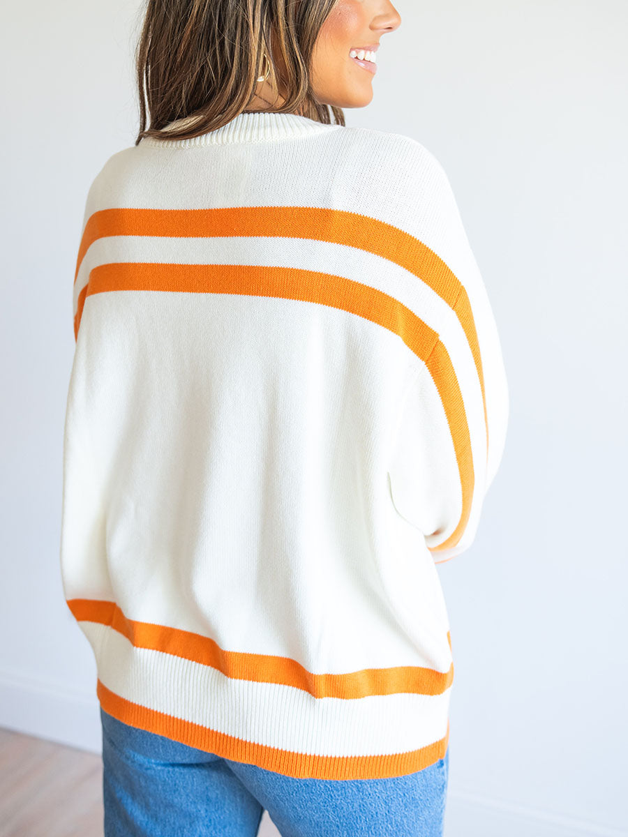 orange and cream striped Tennessee sweater