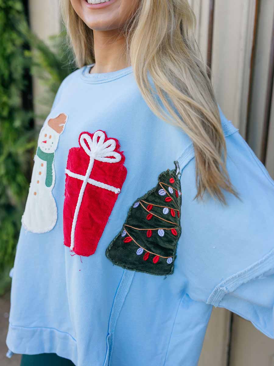 Light Blue Sweatshirt with Christmas Patches **Doorbuster**