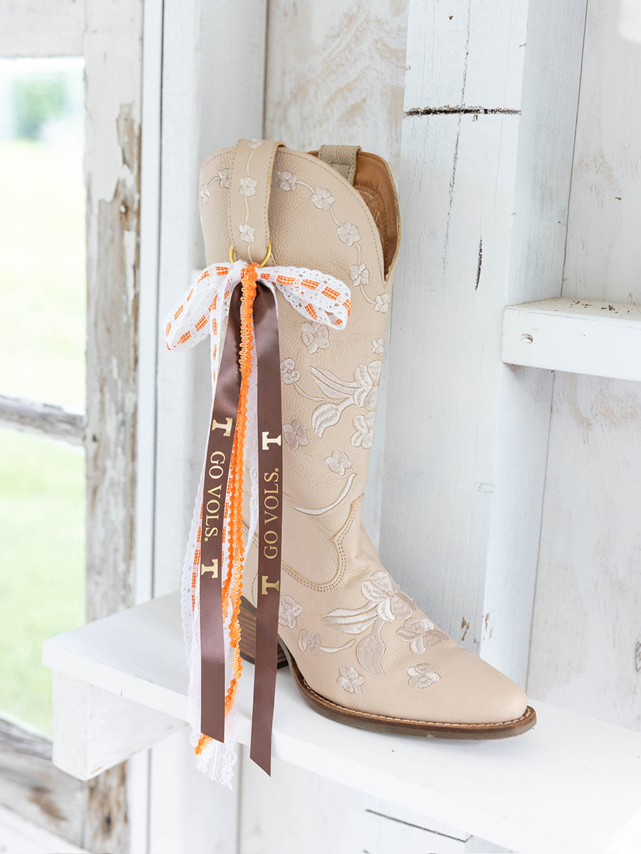 Orange and brown VOLS ribbons on  boots