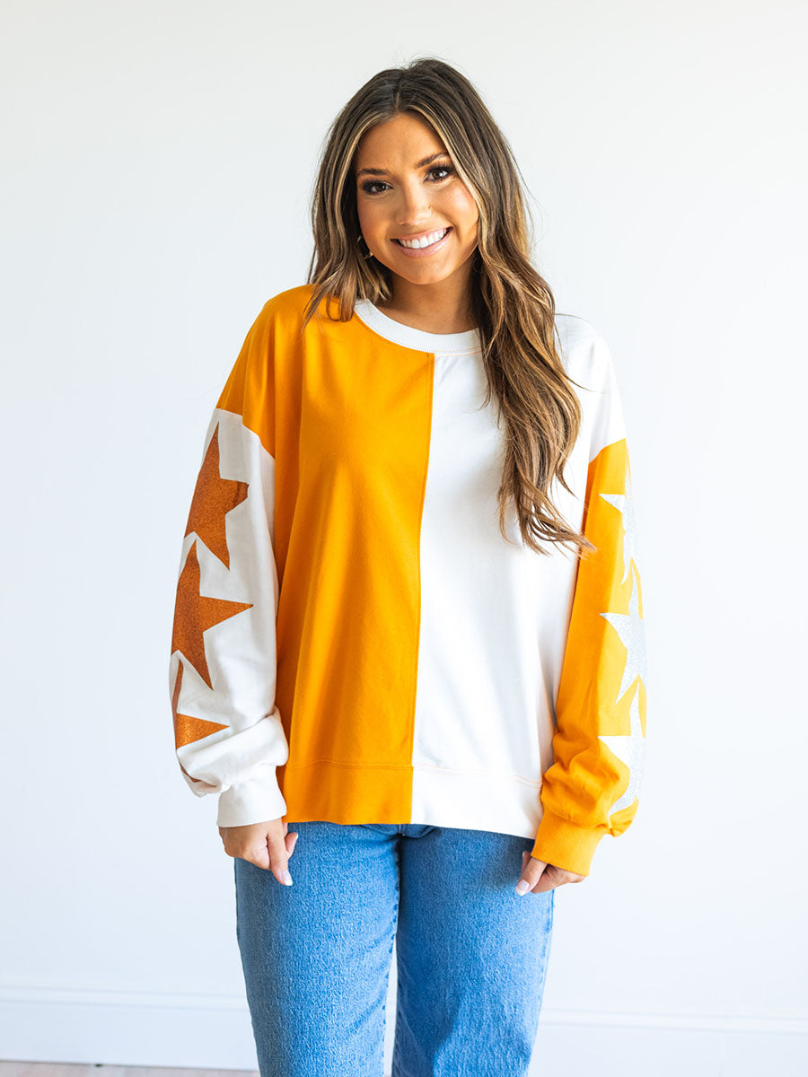 orange and white color block star sleeve sweatshirt