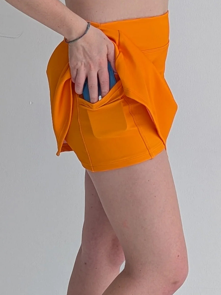 Orange Skort with built in shorts with pocket