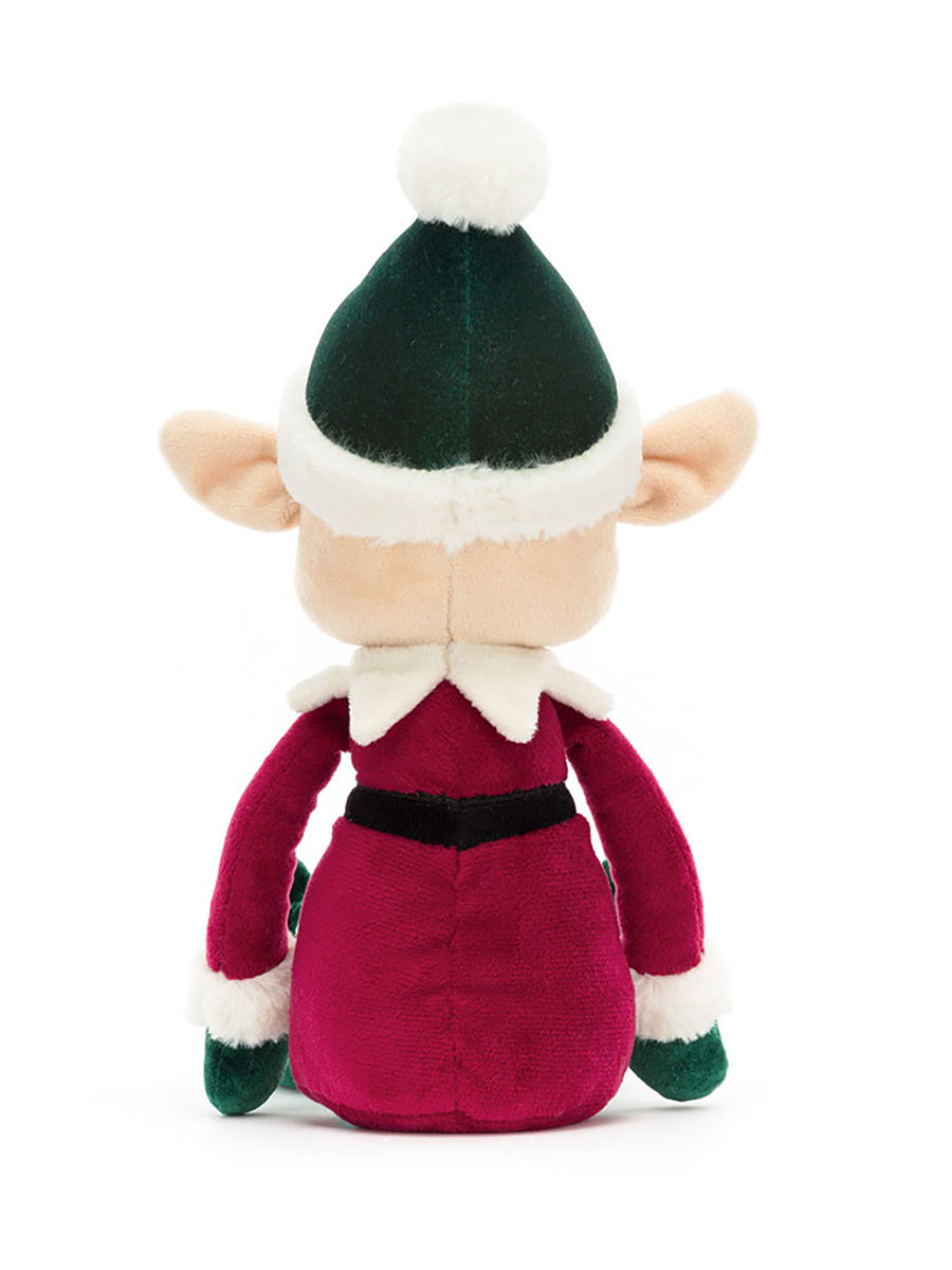 Plush elf toy with green hat and red outfit