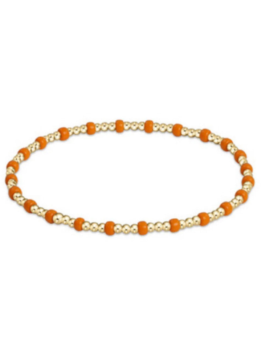 orange and gold beaded bracelet