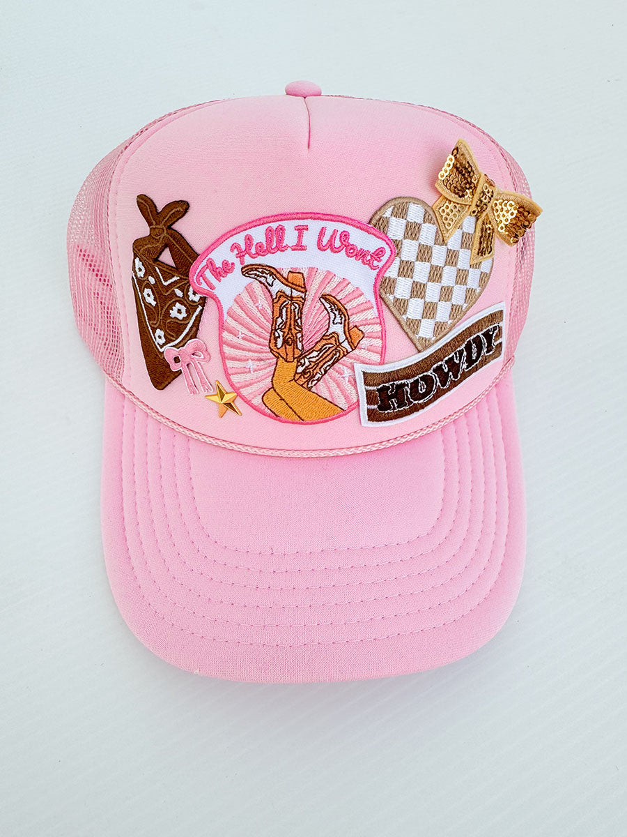 Pink multi-patch trucker hat with western flair patches