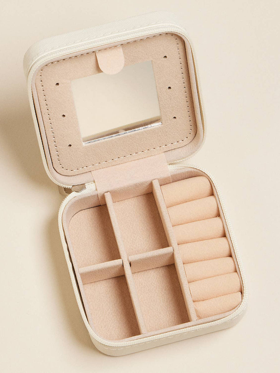 Inside Sections of a small jewelry box