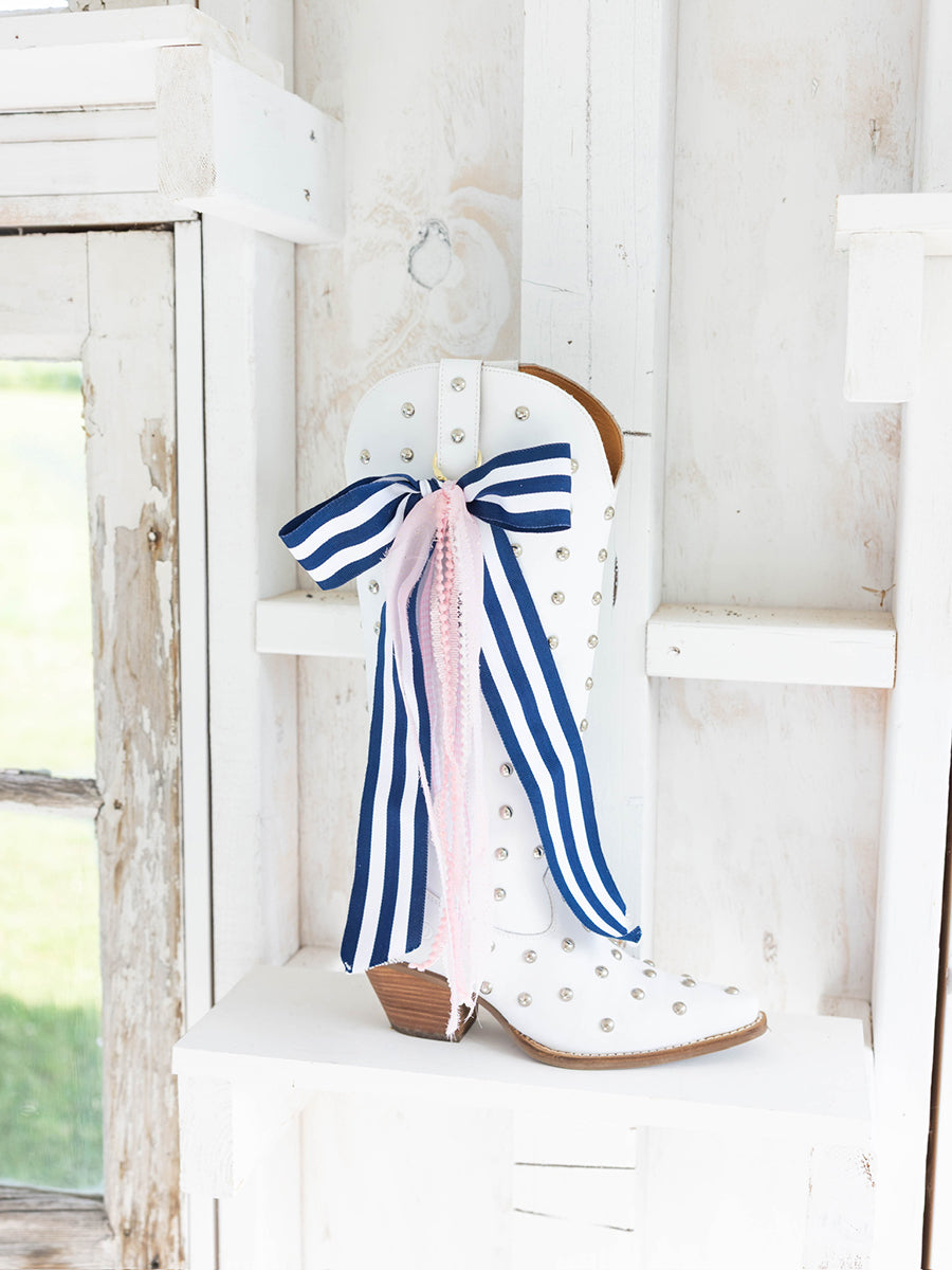 White cowboy boots with boot bow