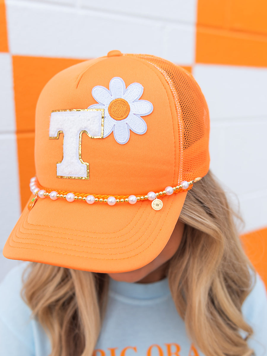 orange hat with Power T flower patch