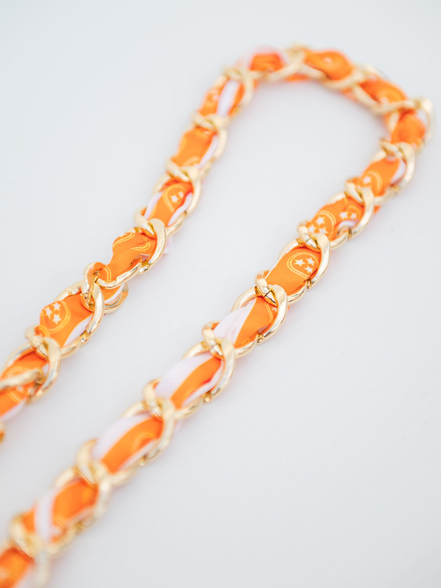 orange and white tri-star purse strap