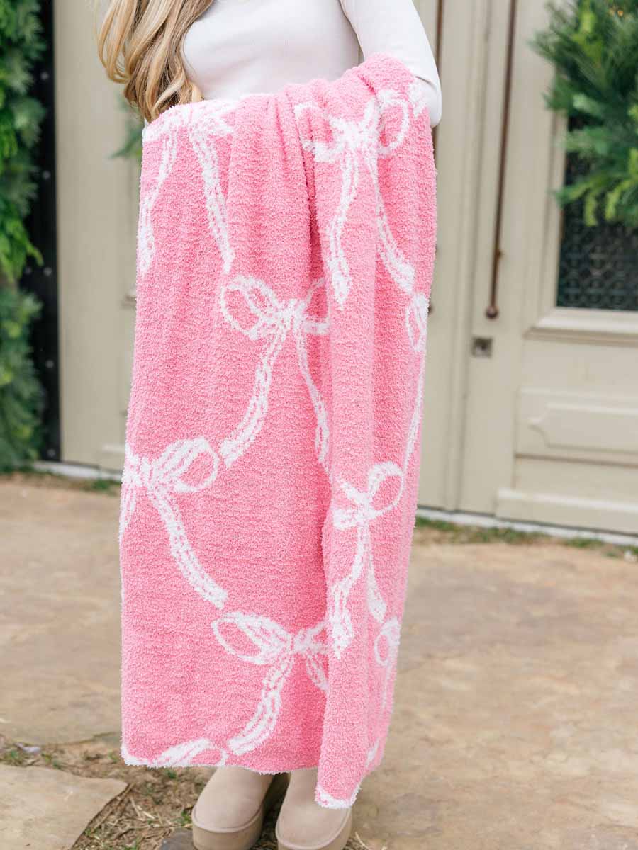 White Bows on Pink Blanket