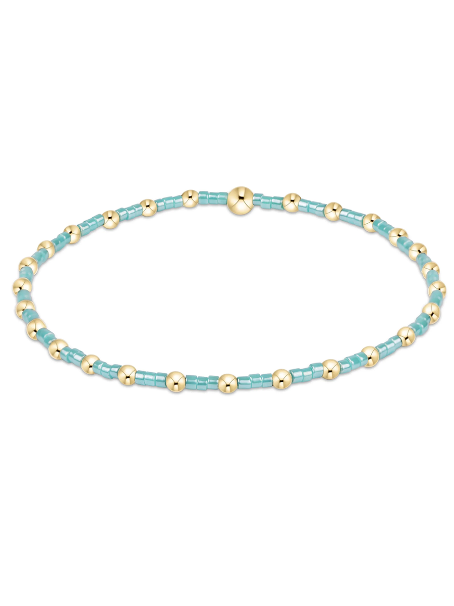 mint green seed and gold bead bracelet