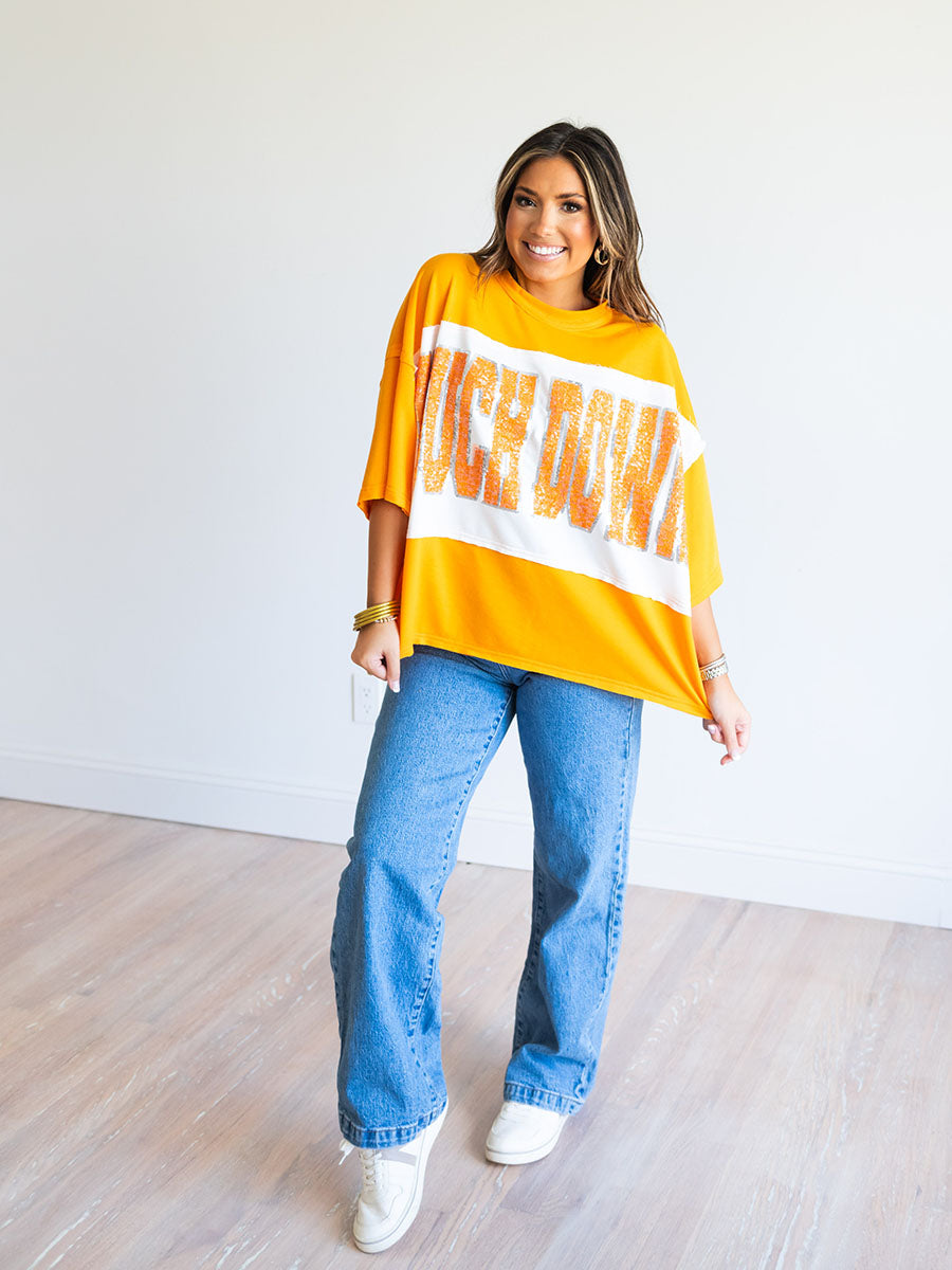 Orange and white color block top