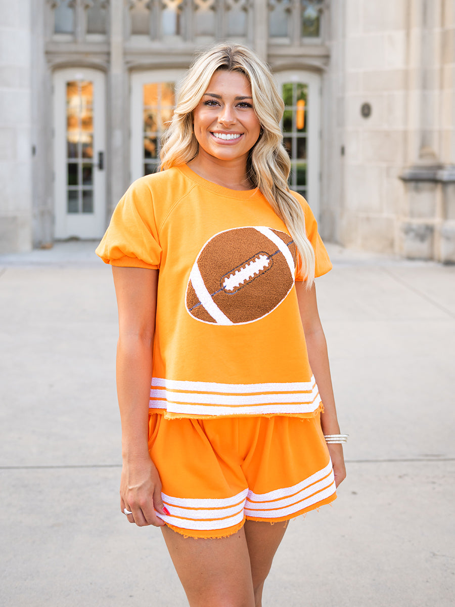 Orange striped game day top and shorts