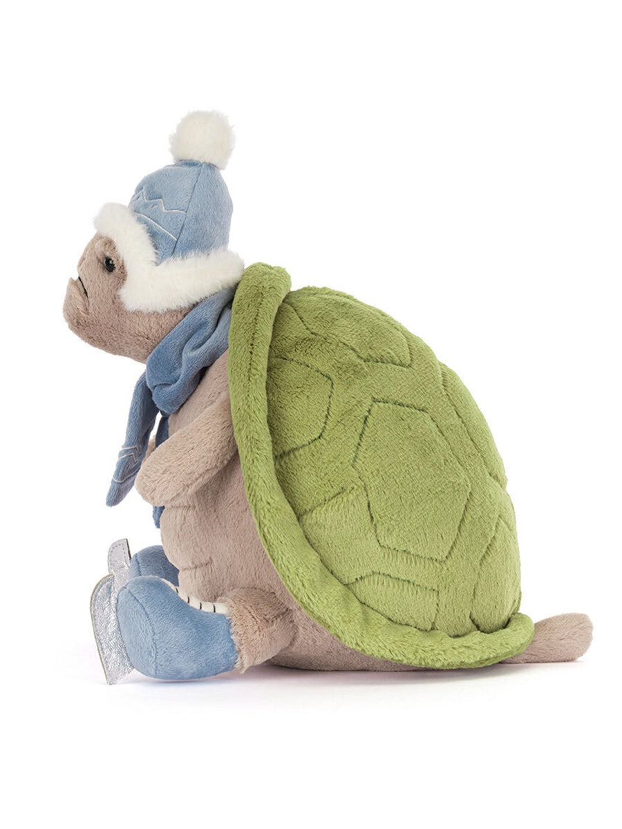 Jellcat turtle plush with a blue hat, scarf, and skates