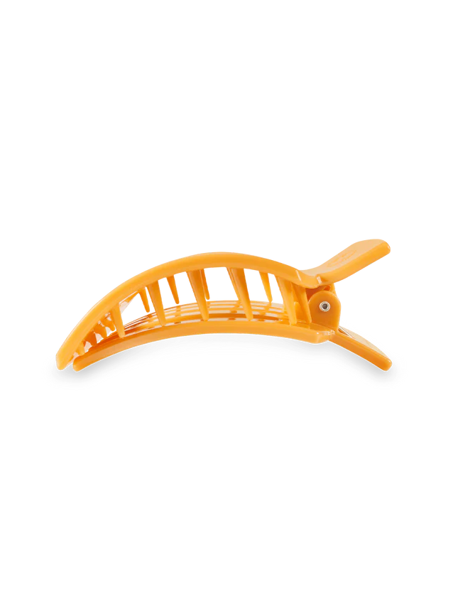 side view of orange hair clip