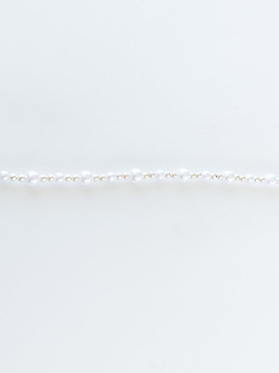 Decorative hand-beaded pearl strand