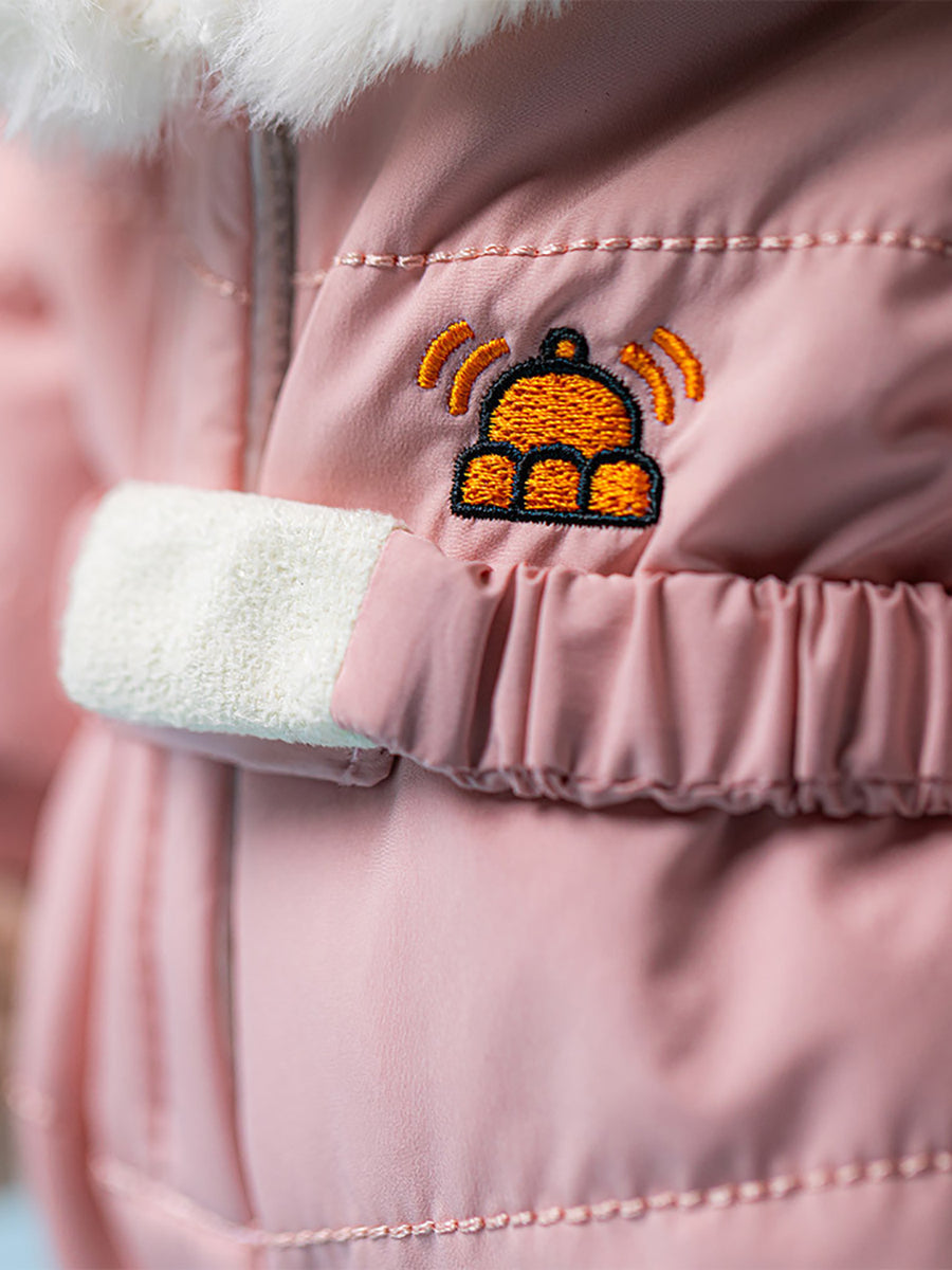 Bunny in pink winter snowsuit