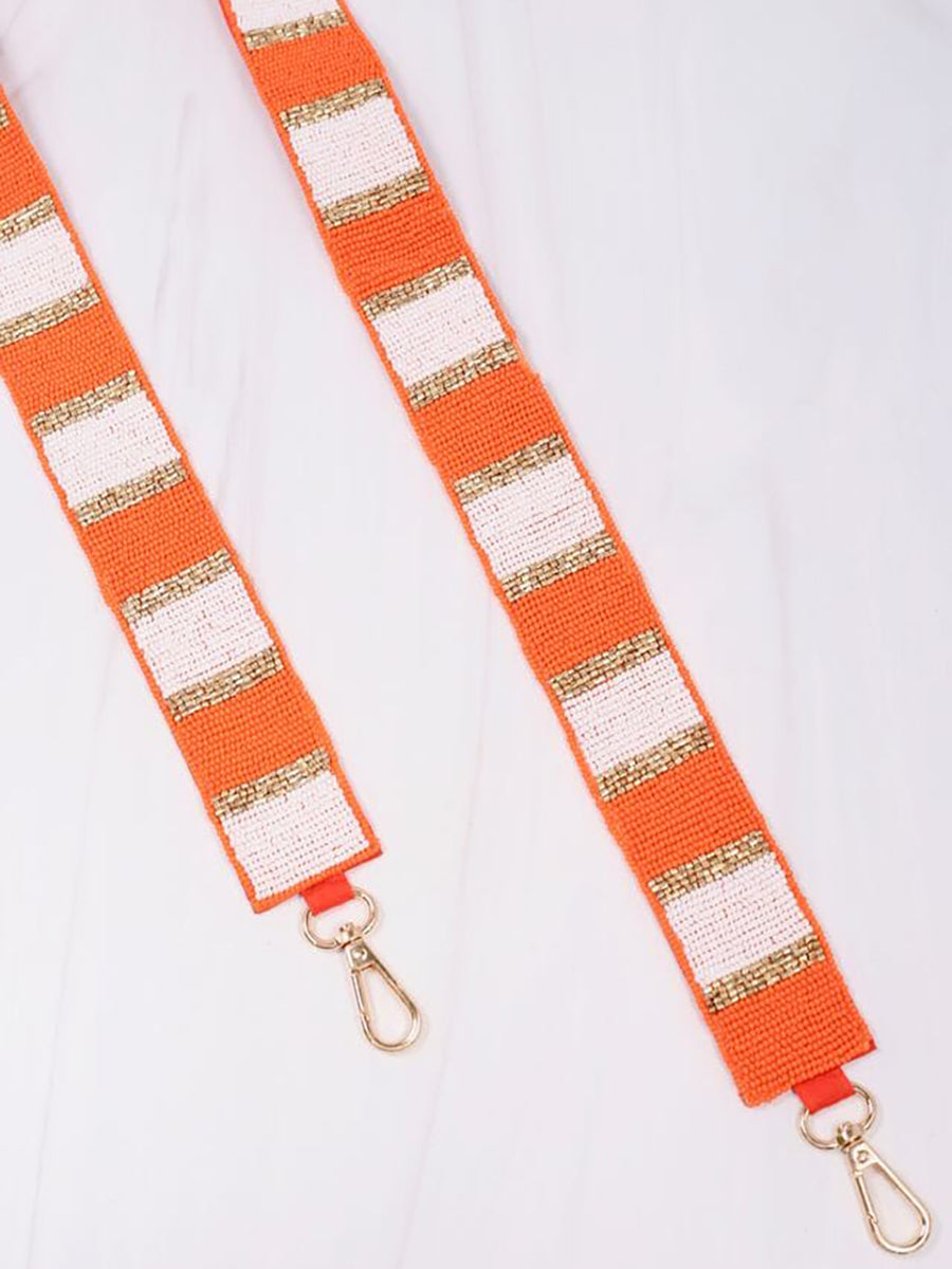 orange and white beaded purse strap