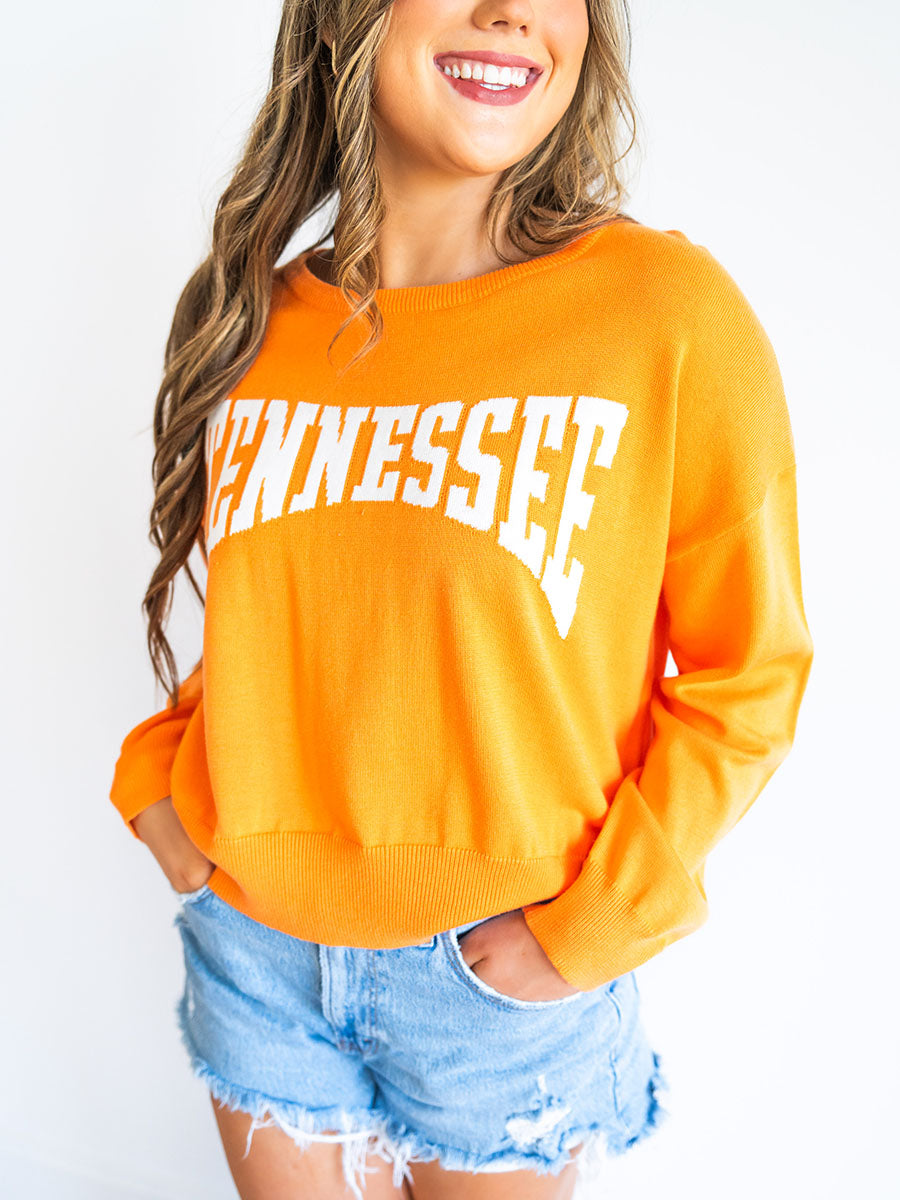 Orange lightweight sweater with "Tennessee"