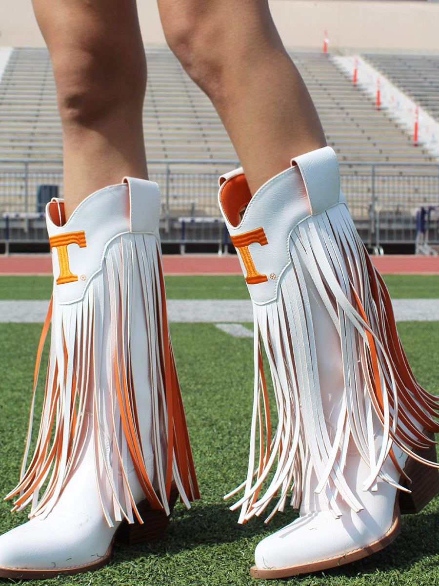 White boots with Power T and fringe